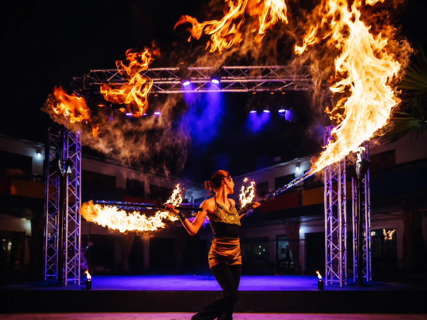 SpinElements fire performer on a professionally lit stage